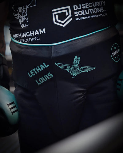 Titan Bespoke Ares groin guard in custom black leather with mint trim, personalised LETHAL LOUIS name and Parachute Regiment wings